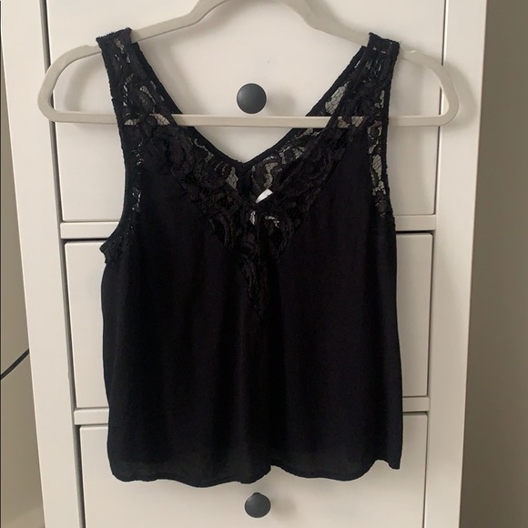 Sleeveless blouse with lace detail - Picture 1 of 5